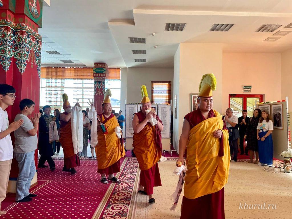 A Solemn Procession with Traditional Buddhist Symbols