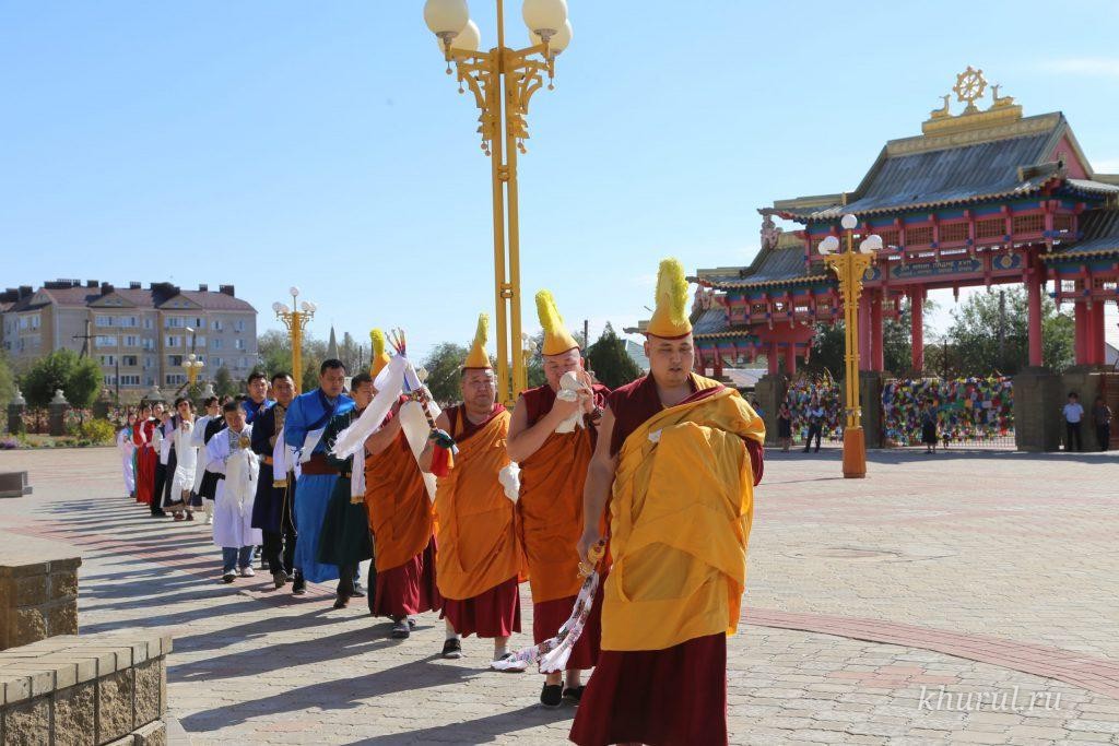 A Solemn Procession with Traditional Buddhist Symbols