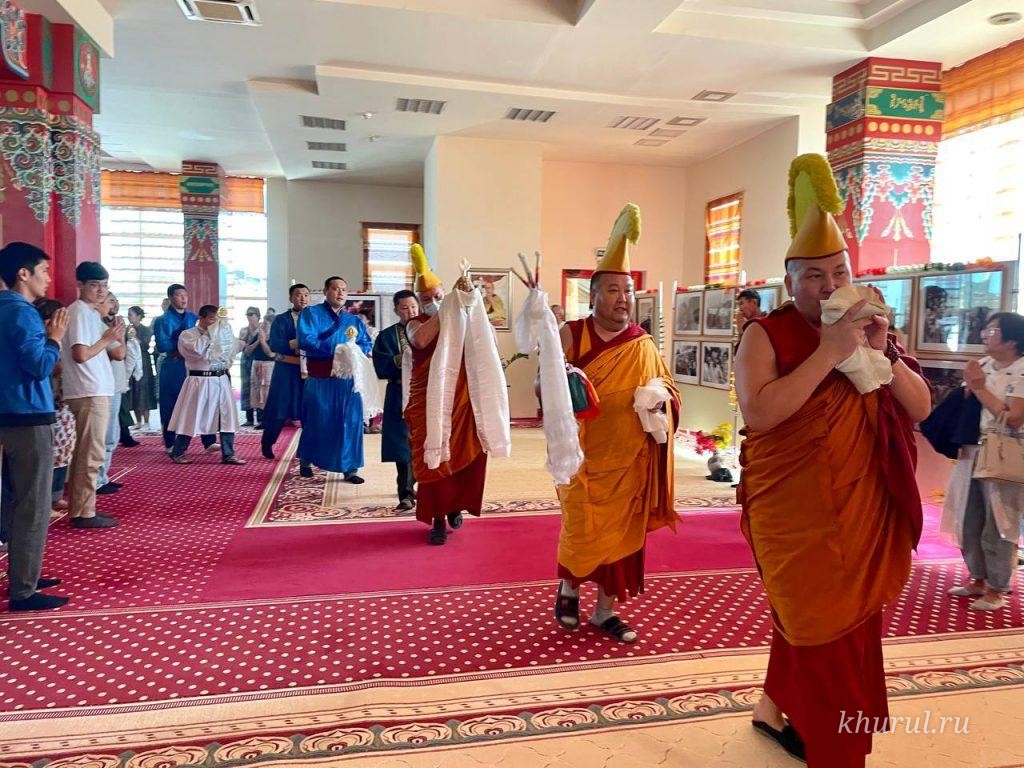 A Solemn Procession with Traditional Buddhist Symbols