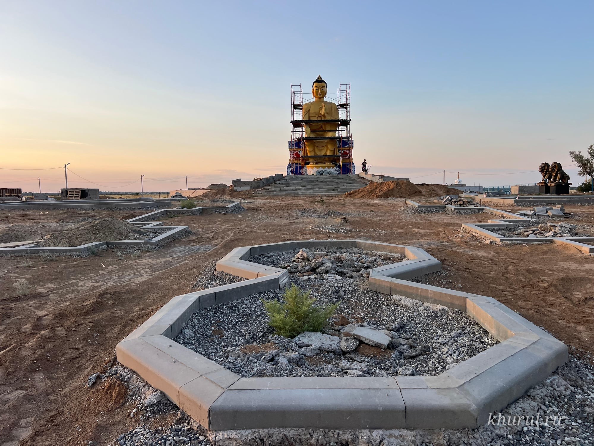Landscaping is underway in front of the Maitreya Buddha statue in Lagan